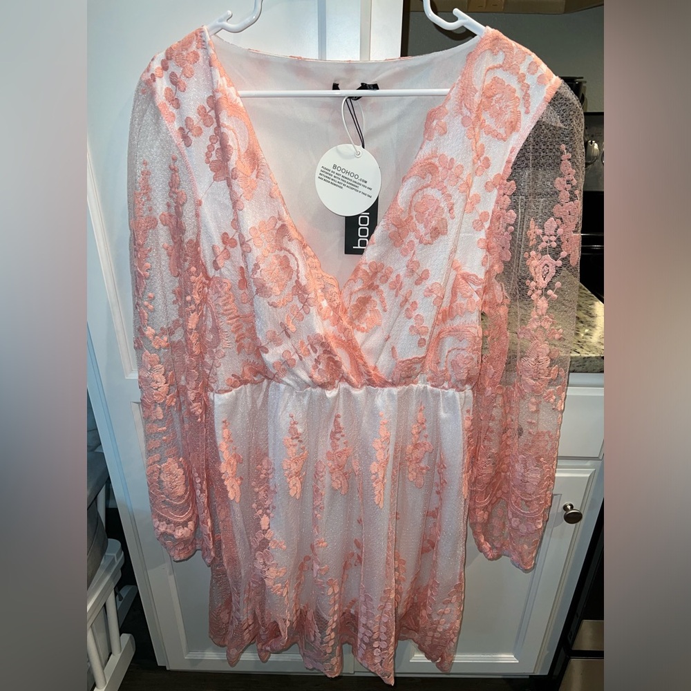 a beautiful Boohoo dress I never wore still has the tags, size 18